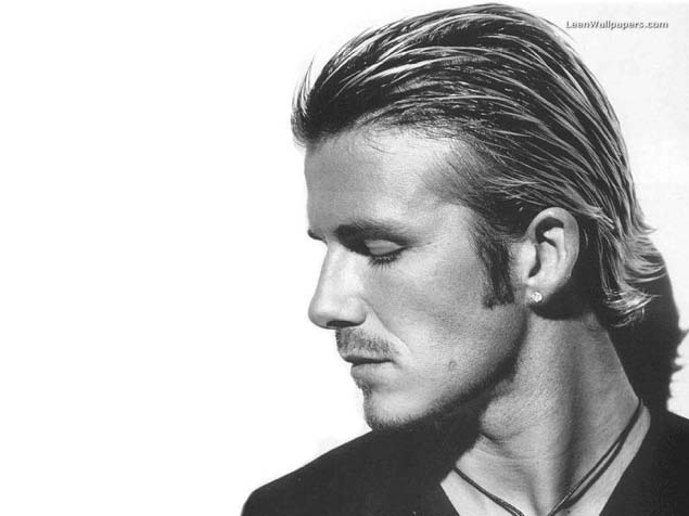 David Beckham with Long Hair and diamond earrings