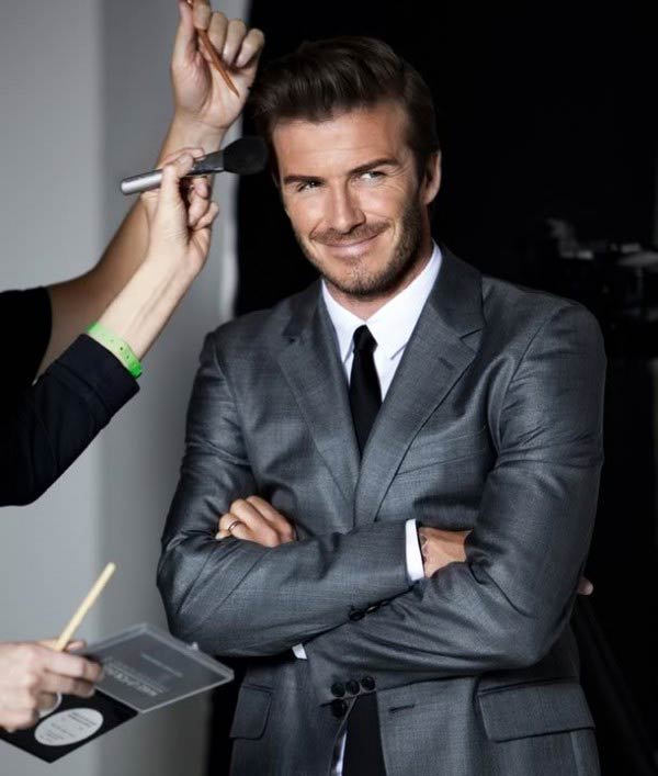 David Beckham loves Male grooming- getting makeup applied