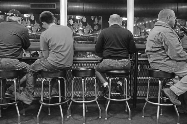 Men drinking in a British pub