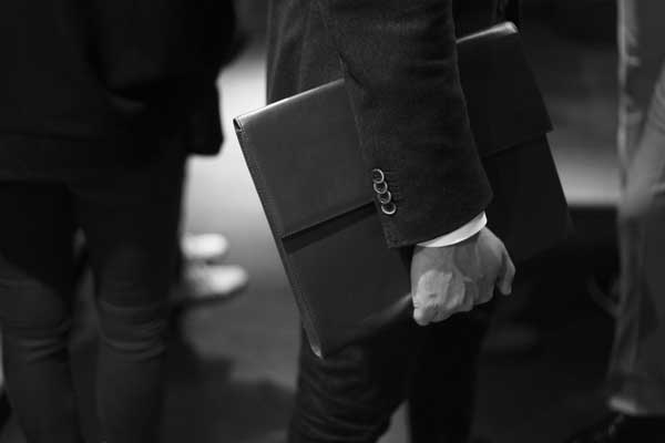 Man walking with slim looking briefcase