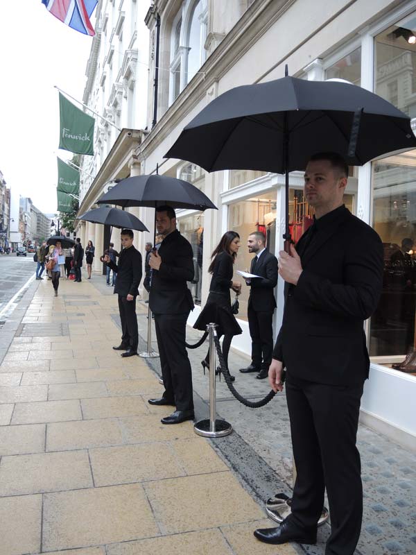Dolce & Gabbana Menswear Store Opening in Bond street London - security wearing D&G suits