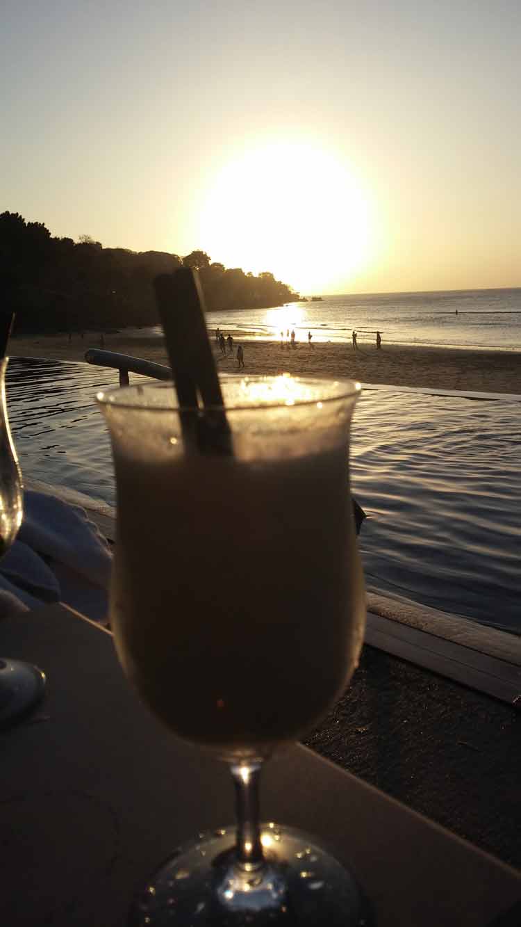enjoying-sunset-at-Sundara-beach-club-jimbaran
