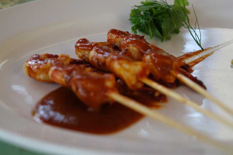 Sate Udang, grilled prawn kebabs with peanut sauce, lawar vegetables and steamed rice