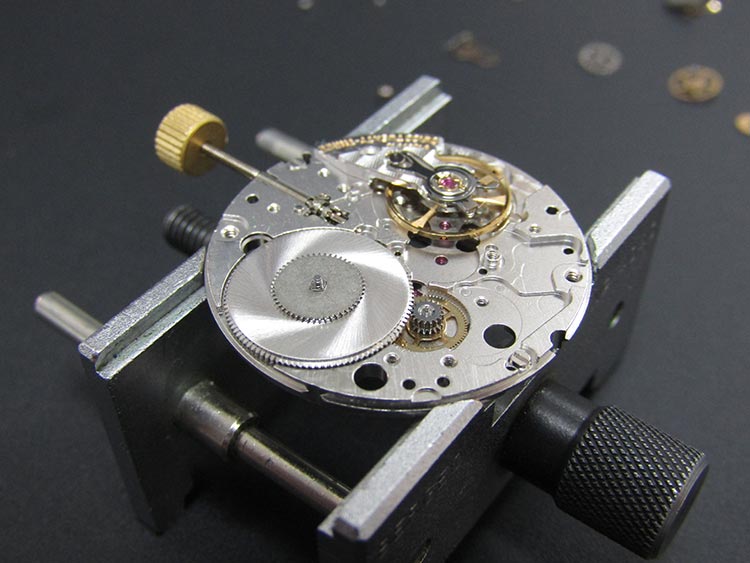  “Watch movement skilfully re-assembled and checked for accuracy” Omega watch