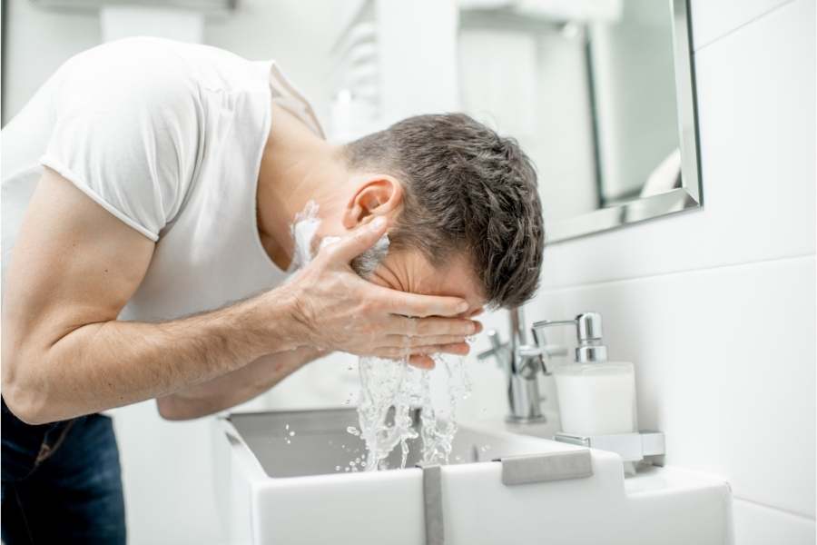 Man washing face