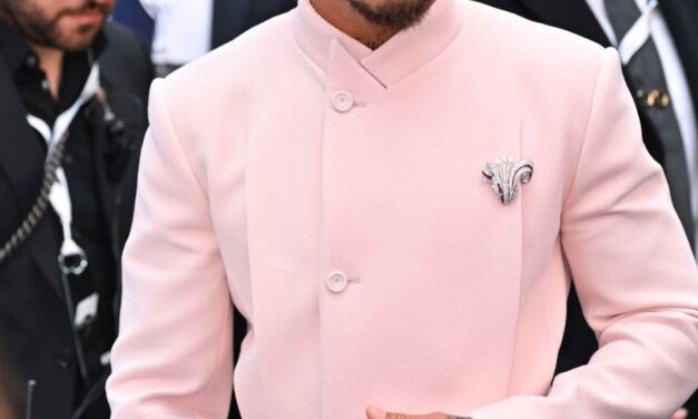 Lewis Hamilton’s Lilac Lapel Moment – A Brooch, A GOAT, and the Formula for Fashion Greatness