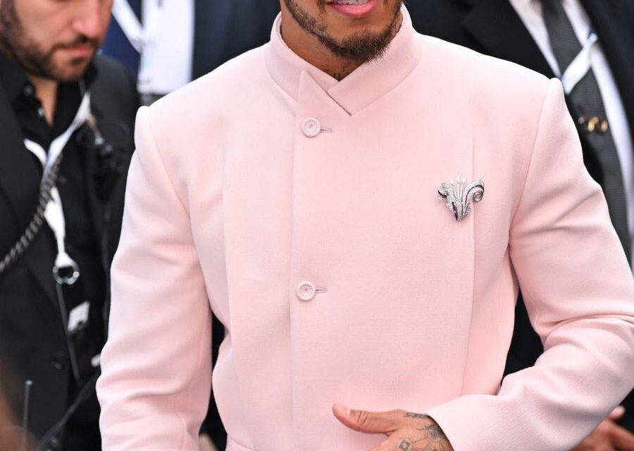 Lewis Hamilton’s Lilac Lapel Moment – A Brooch, A GOAT, and the Formula for Fashion Greatness