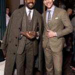 Who Sets the Trend for Suits, Layering and Long Capes?