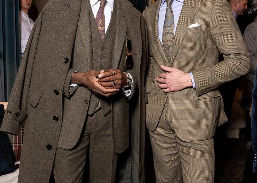 Who Sets the Trend for Suits, Layering and Long Capes?